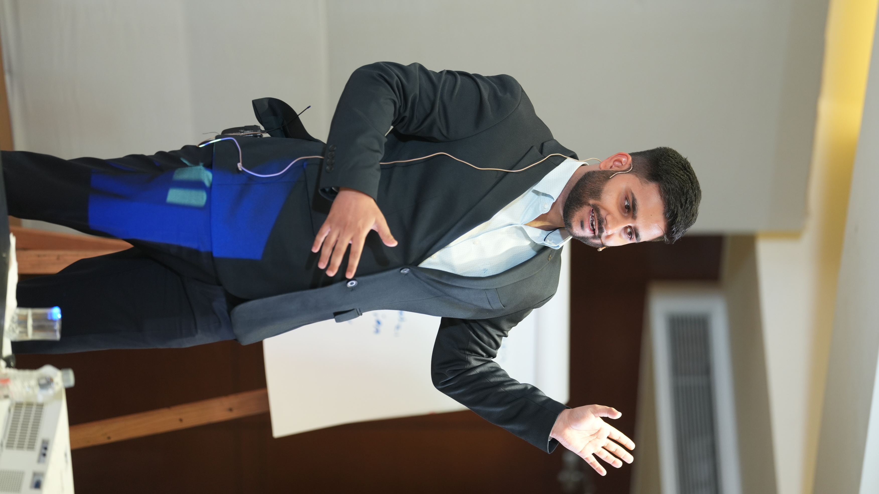 Navin Parmar speaking at a workshop